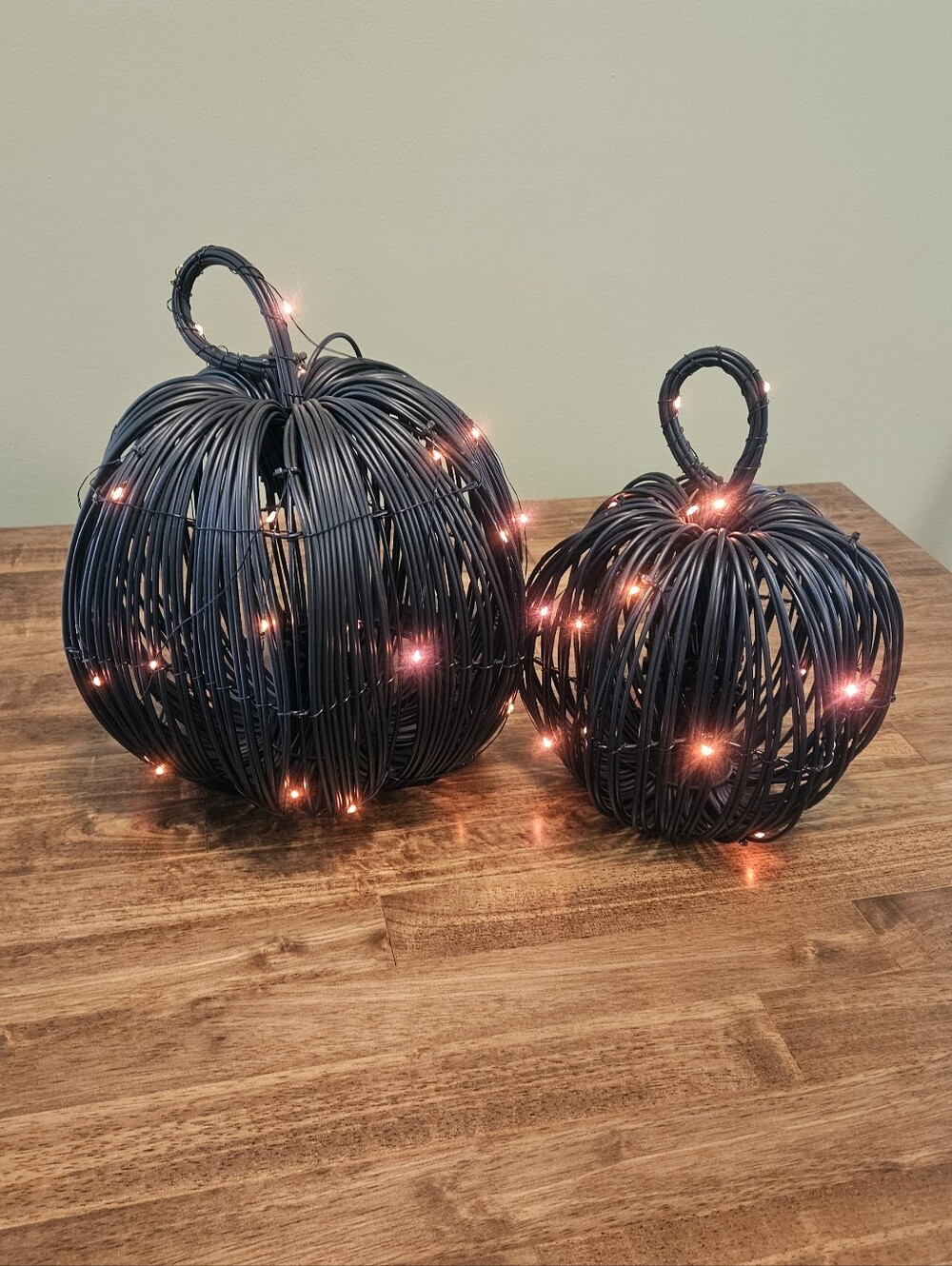 Black Wicker Pumpkin Pair with Orange String Lights